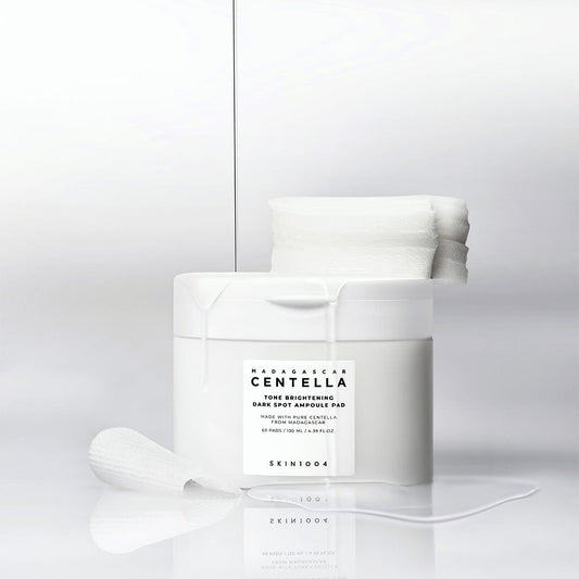 بادات سينتيلا لتفتيح البشرة مدغشقر - 130مل | SKIN1004 madagascar centella tone brightening dark spot ampoule pad - Barbie.phar