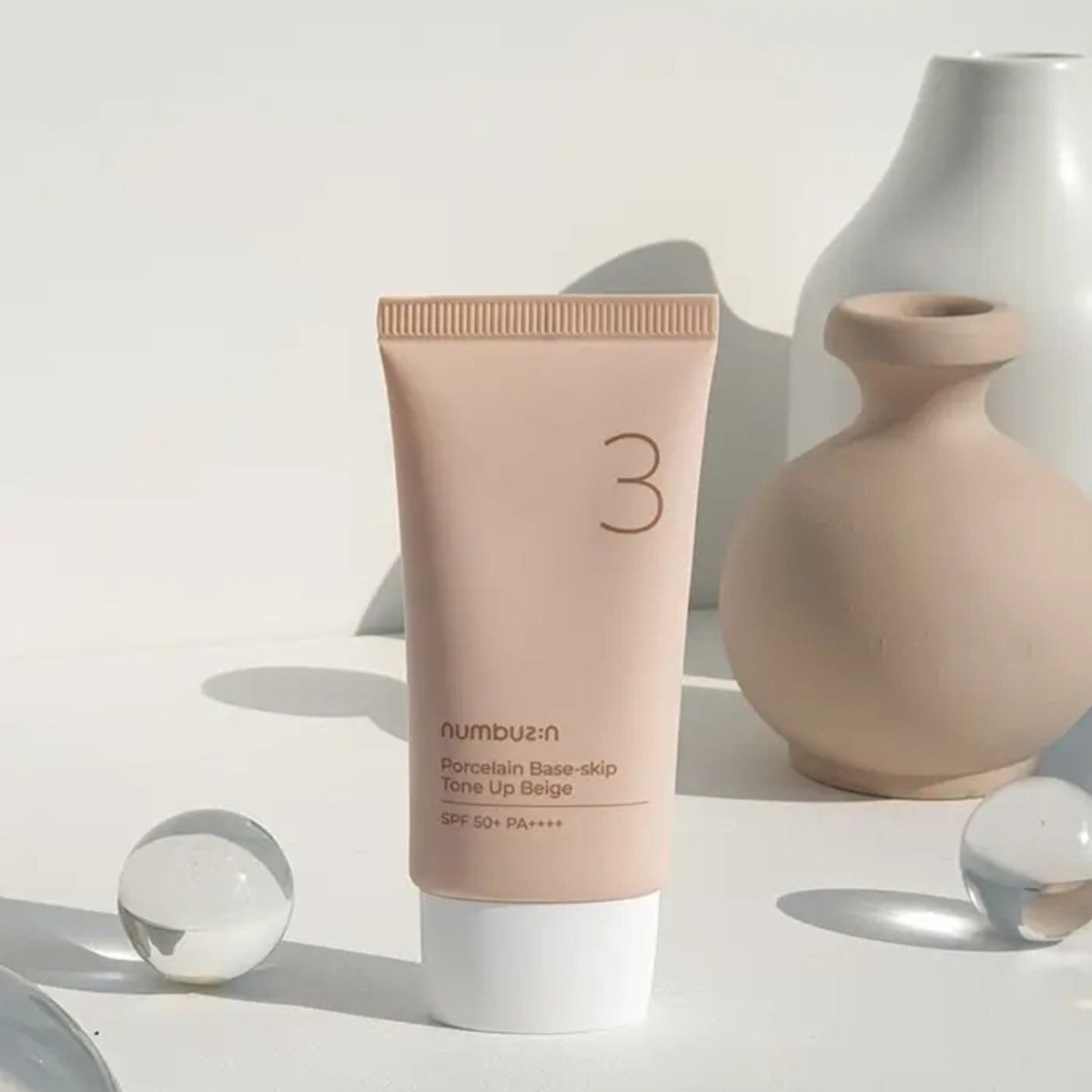 برايمر و واقي شمس نمبوزين - 50مل | Numbuzin Porcelain Base Skip Tone Up Beige Cream Spf50 Pa+++ - Barbie.phar
